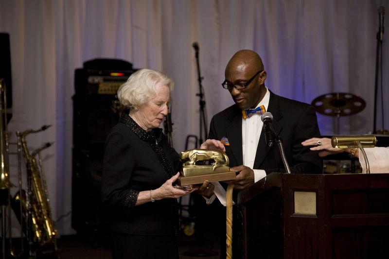 Dr. Achampong presenting an award for philanthropy to Carolyn Eberly-Blaney